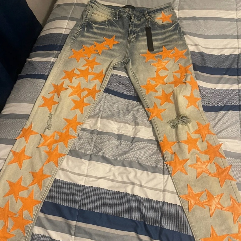 Orange star AMIRI jeans that i bought at REVIVE for $1,190